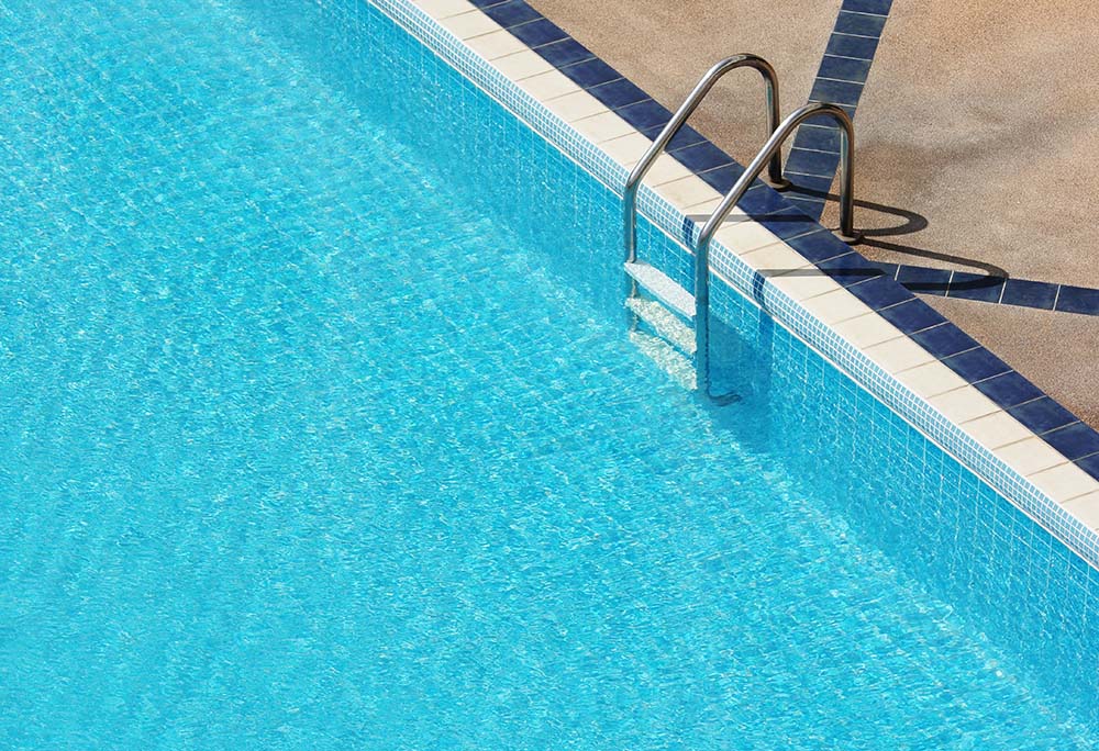 image of a swimming pool with ladder